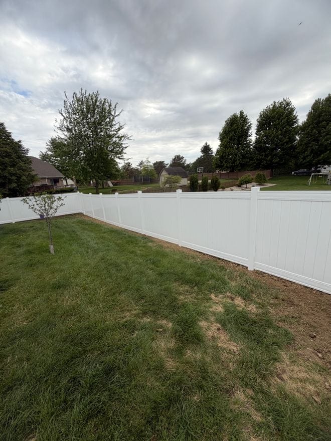 White vinyl privacy fence